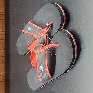 The North Face woman size 6 flip flop red